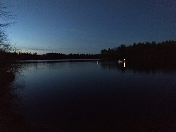 crew shell on lake before sunrise