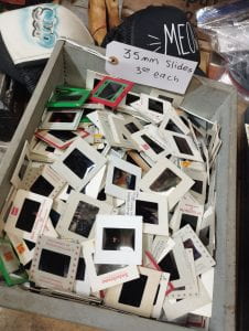 Image of a box of mini photo films at a vintage market.