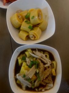 Tibetan food in two white bowls.