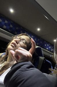 Tenzin sleeping on a bus. 