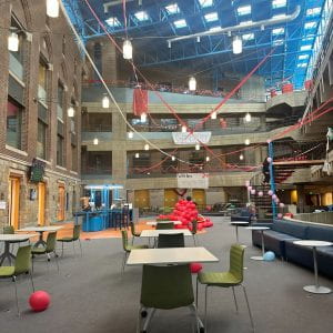 Image of the Science Center festooned with red banners and ballons.